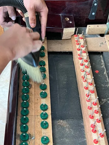 Cleaning around the key-bed pins
