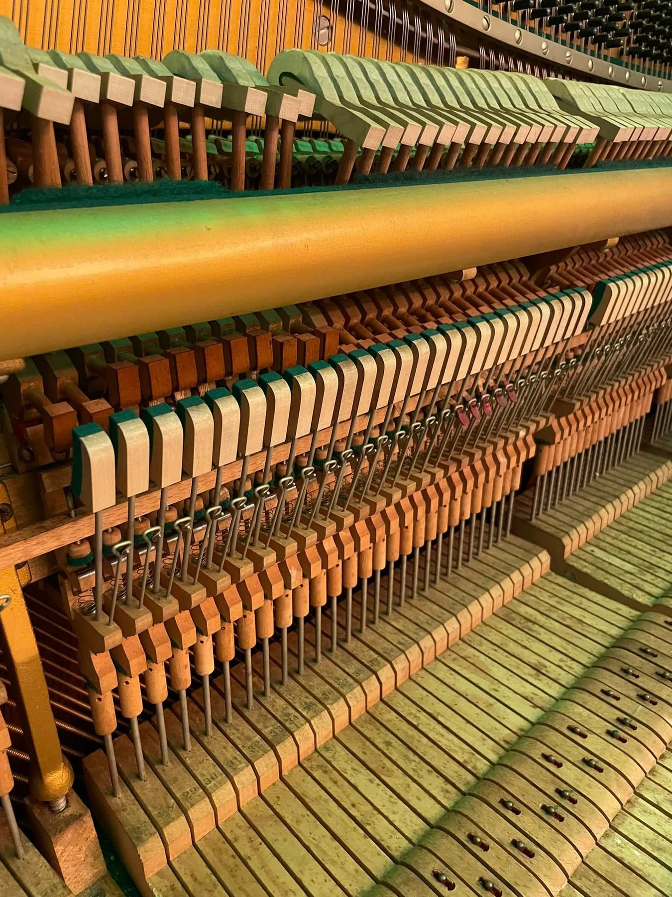 Close-up of piano hammers and action